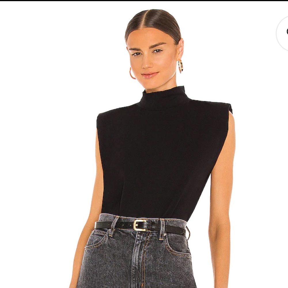 Mock Neck Shoulder Pad Tee in Black. Revolve
